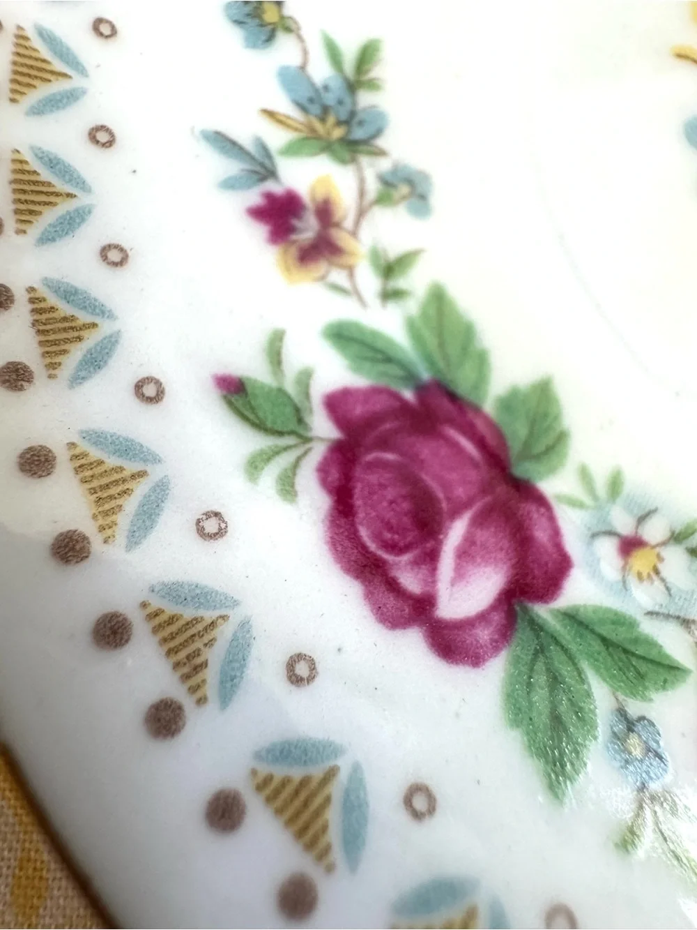 Vintage Espresso Cup and Matching Saucer. White Porcelain with Floral Motif.